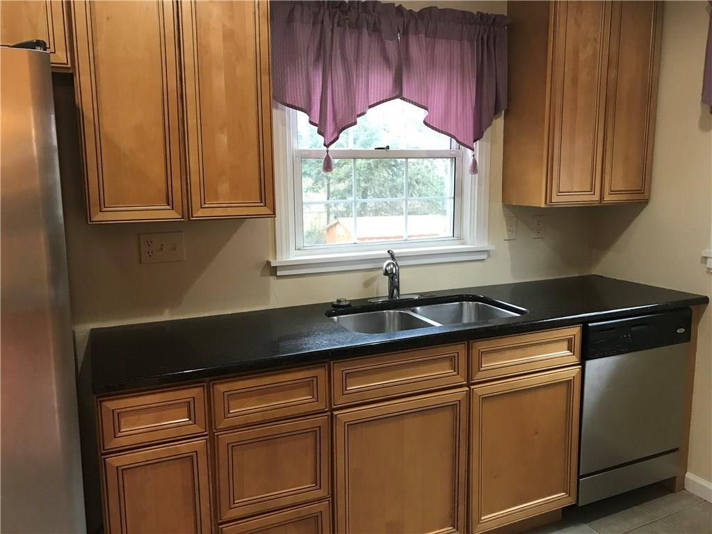 421 Sleepy Hollow Road Pittsburgh, PA 15228 - Photo 4 of 18 Updated kitchen with granite and SS appliances