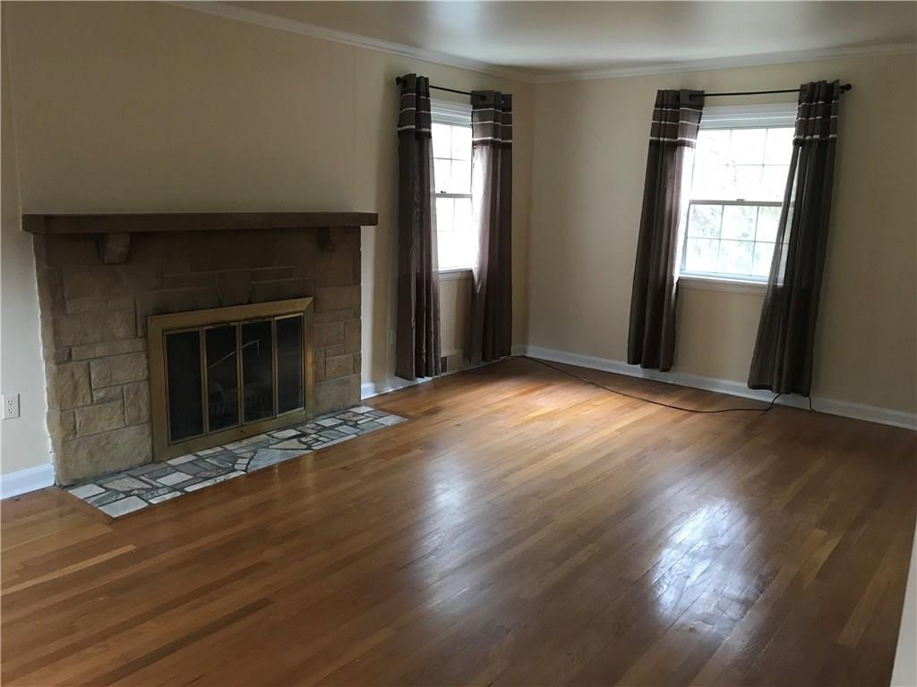 421 Sleepy Hollow Road Pittsburgh, PA 15228 - Photo 8 of 18 Living room with WB fireplace