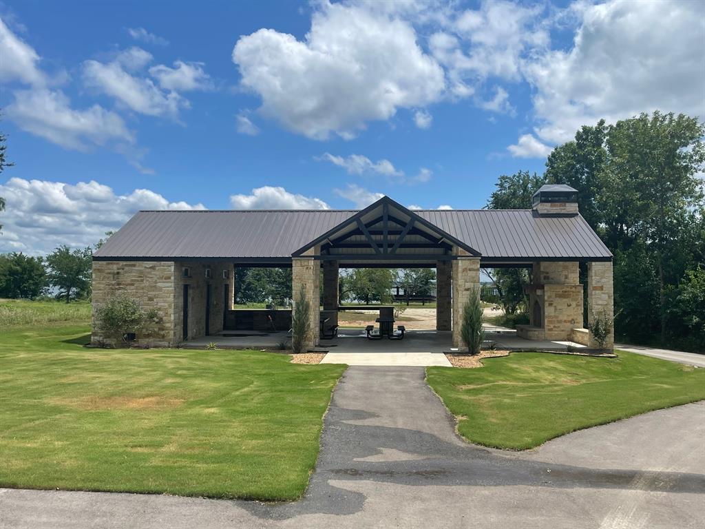 Lot 39 Crestview Corsicana, TX 75109 - Photo 15 of 22 a front view of a house with a yard