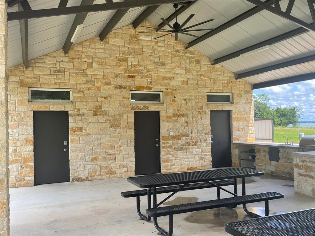 Lot 39 Crestview Corsicana, TX 75109 - Photo 18 of 22 a balcony with furniture and a window