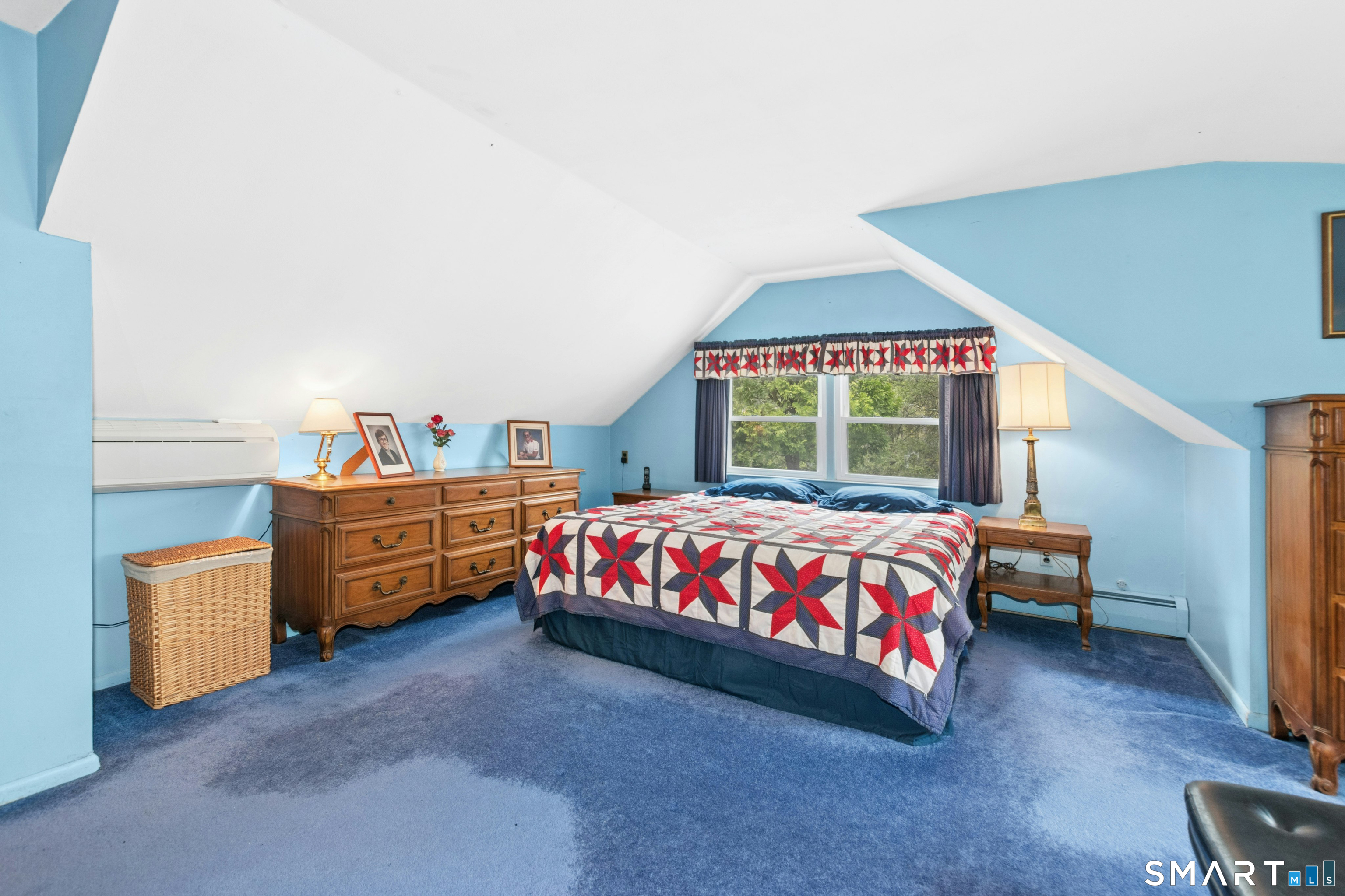 15 Limestone Terrace Ridgefield, CT 06877 - Photo 14 of 32 a bedroom with a bed and a window