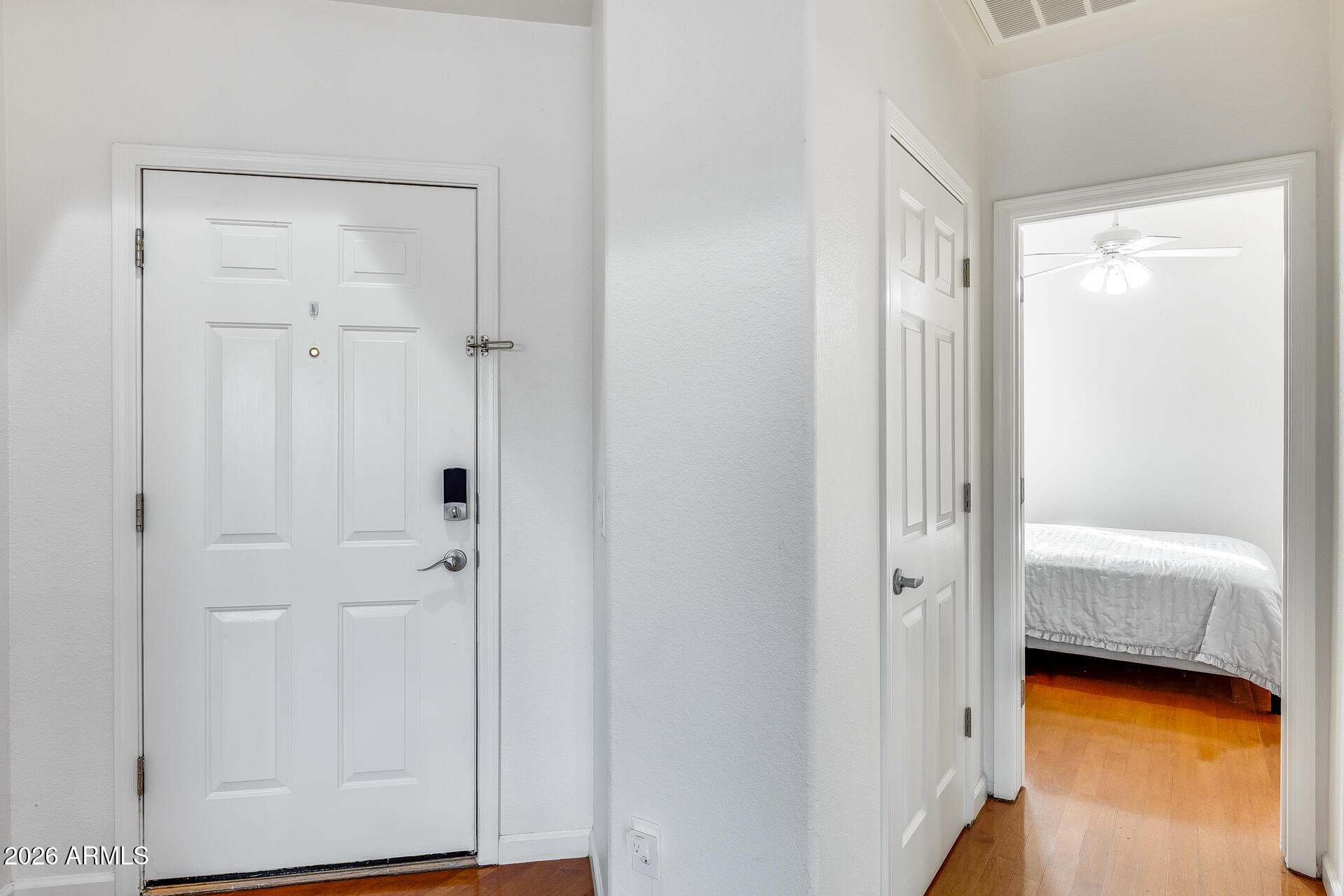 3252 East Fremont Road Phoenix, AZ 85042 - Photo 11 of 45 a view of room with hardwood floor and tub