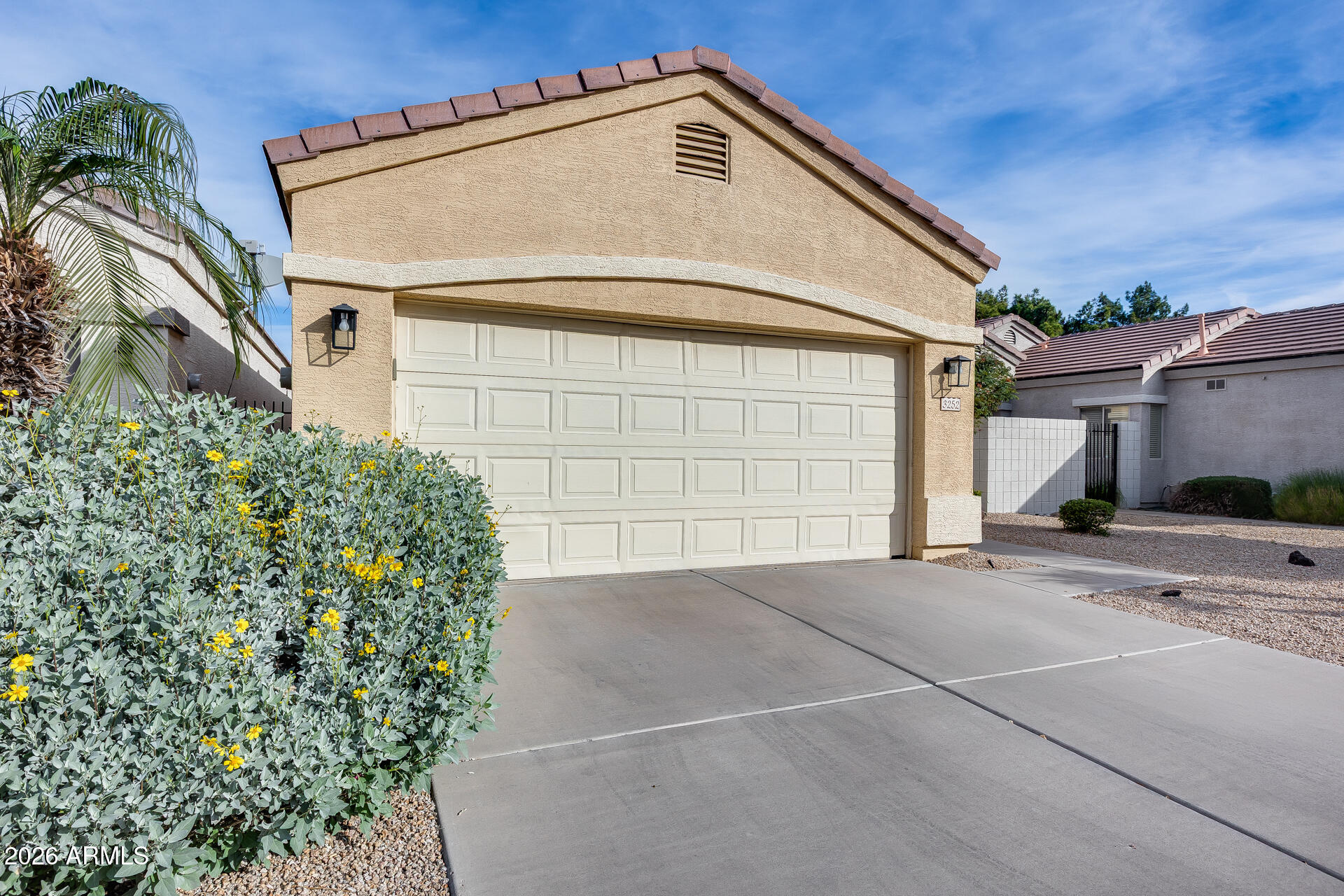 3252 East Fremont Road Phoenix, AZ 85042 - Photo 7 of 45 a view of a house with a garage