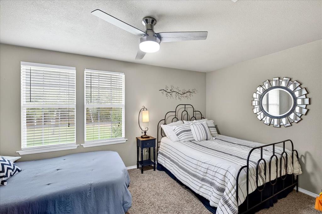 1 Wildflower Lane Athens, TX 75751 - Photo 16 of 23 a bedroom with a bed and a window