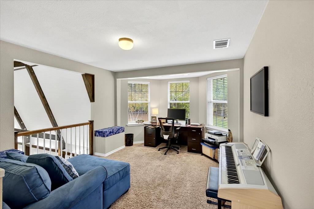 1 Wildflower Lane Athens, TX 75751 - Photo 18 of 23 a living room with furniture bathtub and a window