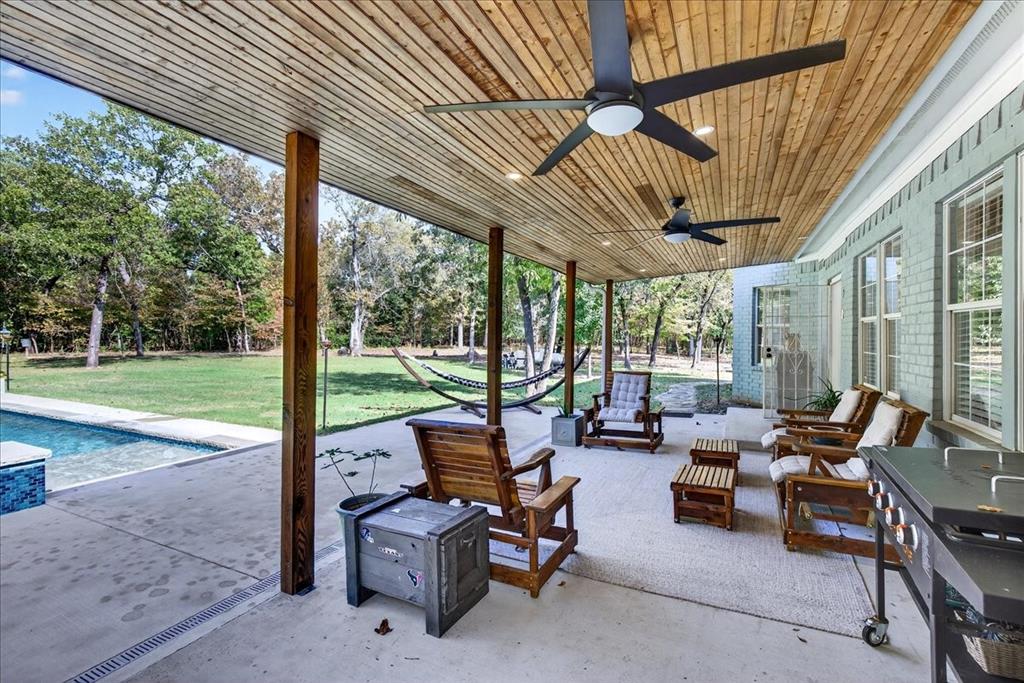 1 Wildflower Lane Athens, TX 75751 - Photo 19 of 23 a view of living room with patio furniture and garden