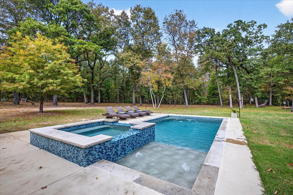 1 Wildflower Lane Athens, TX 75751 - Photo 21 of 23 a view of swimming pool with a patio