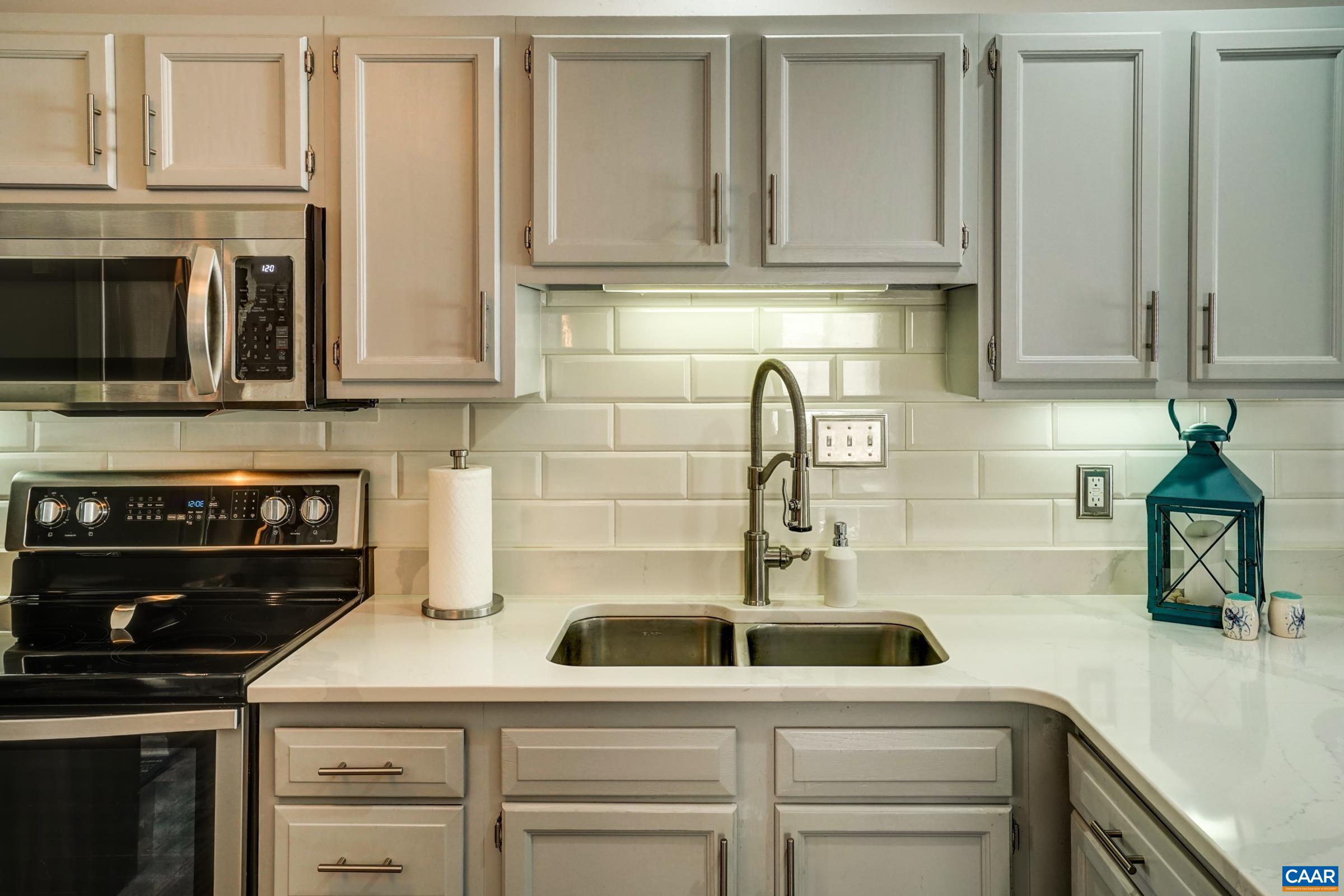 1008 Highlands Drive Charlottesville, VA 22901 - Photo 11 of 41 a kitchen with a sink and cabinets