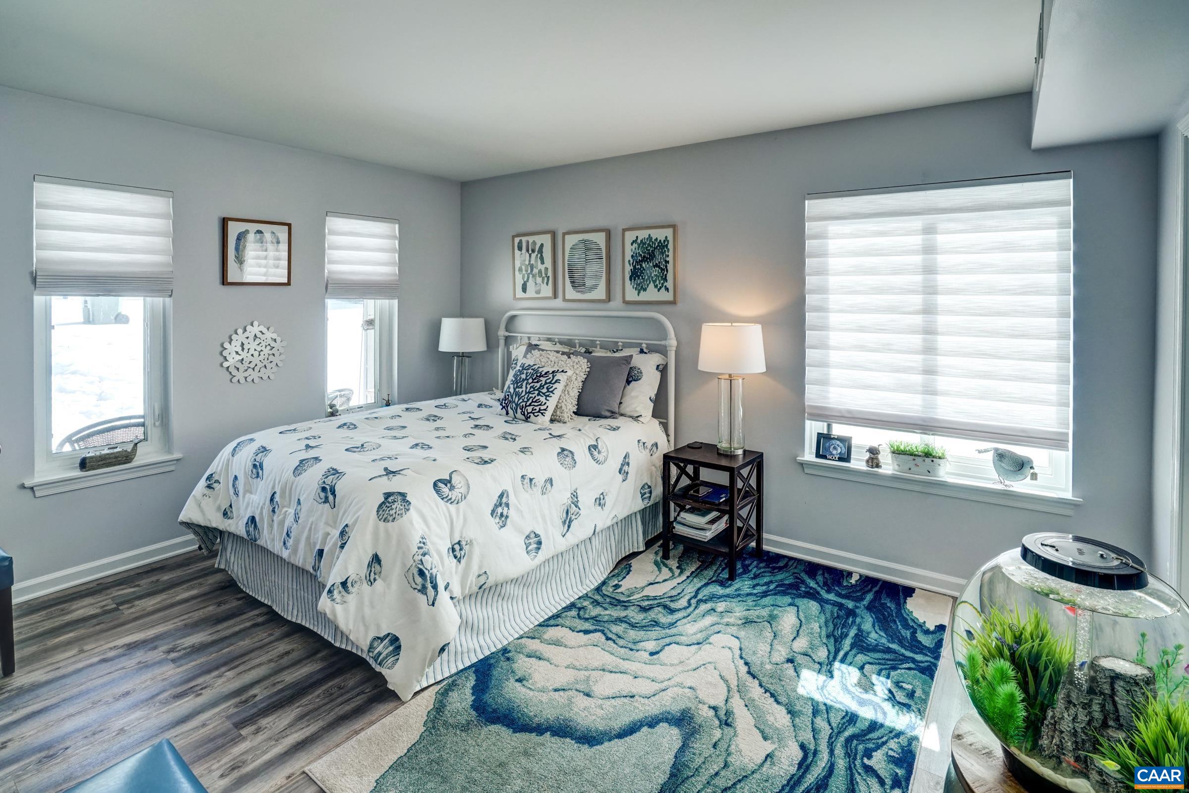 1008 Highlands Drive Charlottesville, VA 22901 - Photo 16 of 41 a bedroom with a bed and windows
