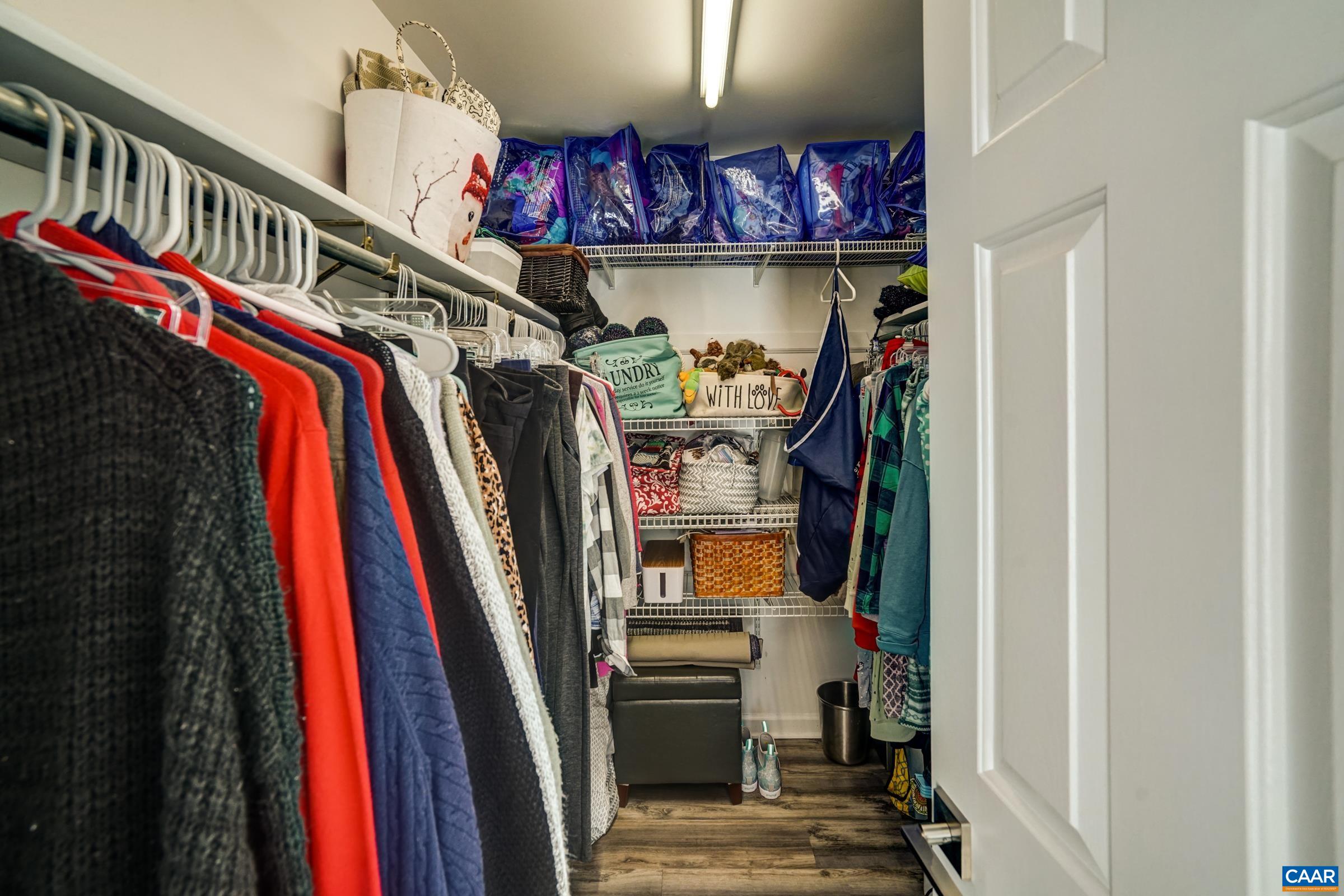 1008 Highlands Drive Charlottesville, VA 22901 - Photo 19 of 41 a view of walk in closet with clothes and shoes