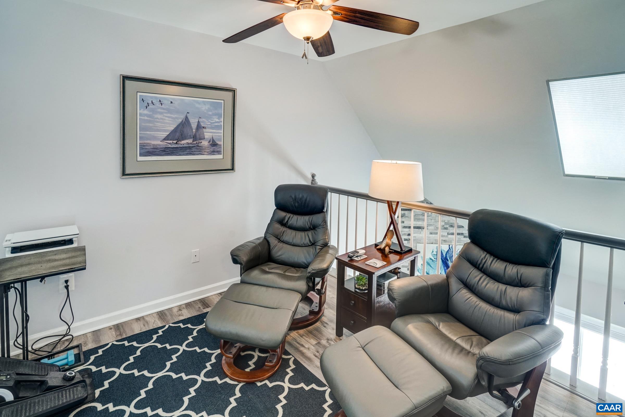 1008 Highlands Drive Charlottesville, VA 22901 - Photo 21 of 41 a living room with furniture and a rug