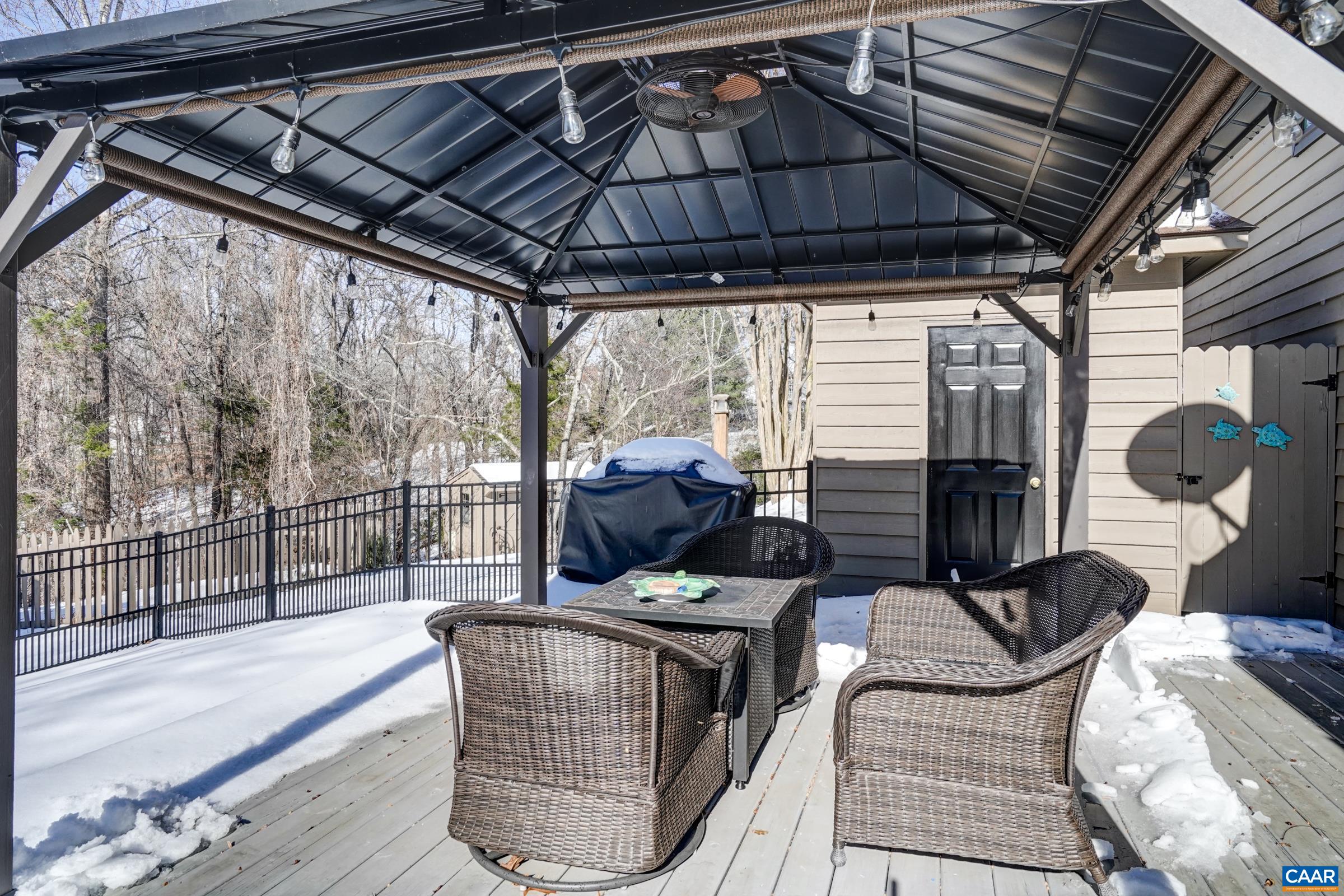 1008 Highlands Drive Charlottesville, VA 22901 - Photo 30 of 41 a living room with furniture a couch and wooden floor