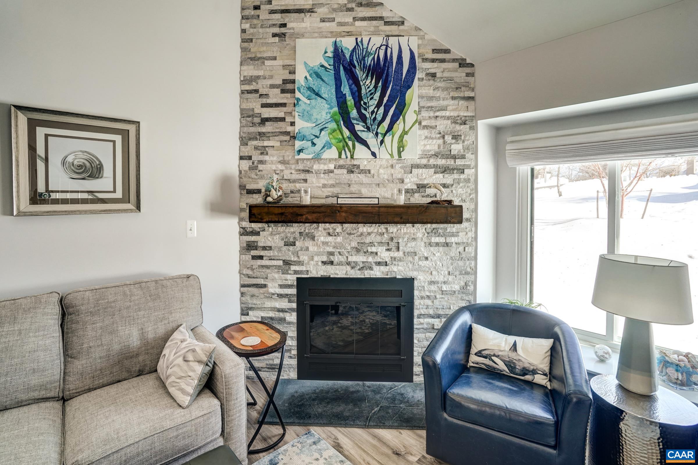 1008 Highlands Drive Charlottesville, VA 22901 - Photo 5 of 41 a living room with furniture and a fireplace