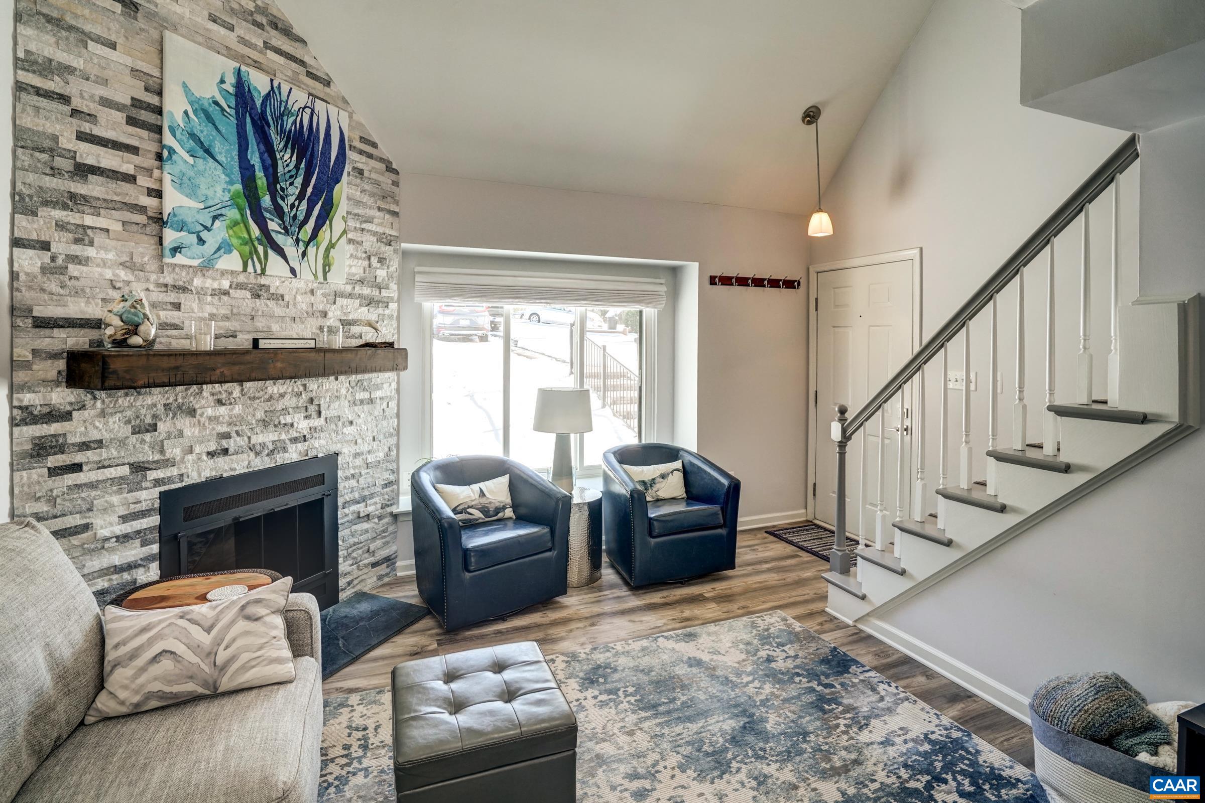 1008 Highlands Drive Charlottesville, VA 22901 - Photo 7 of 41 a living room with furniture fireplace and flat screen tv