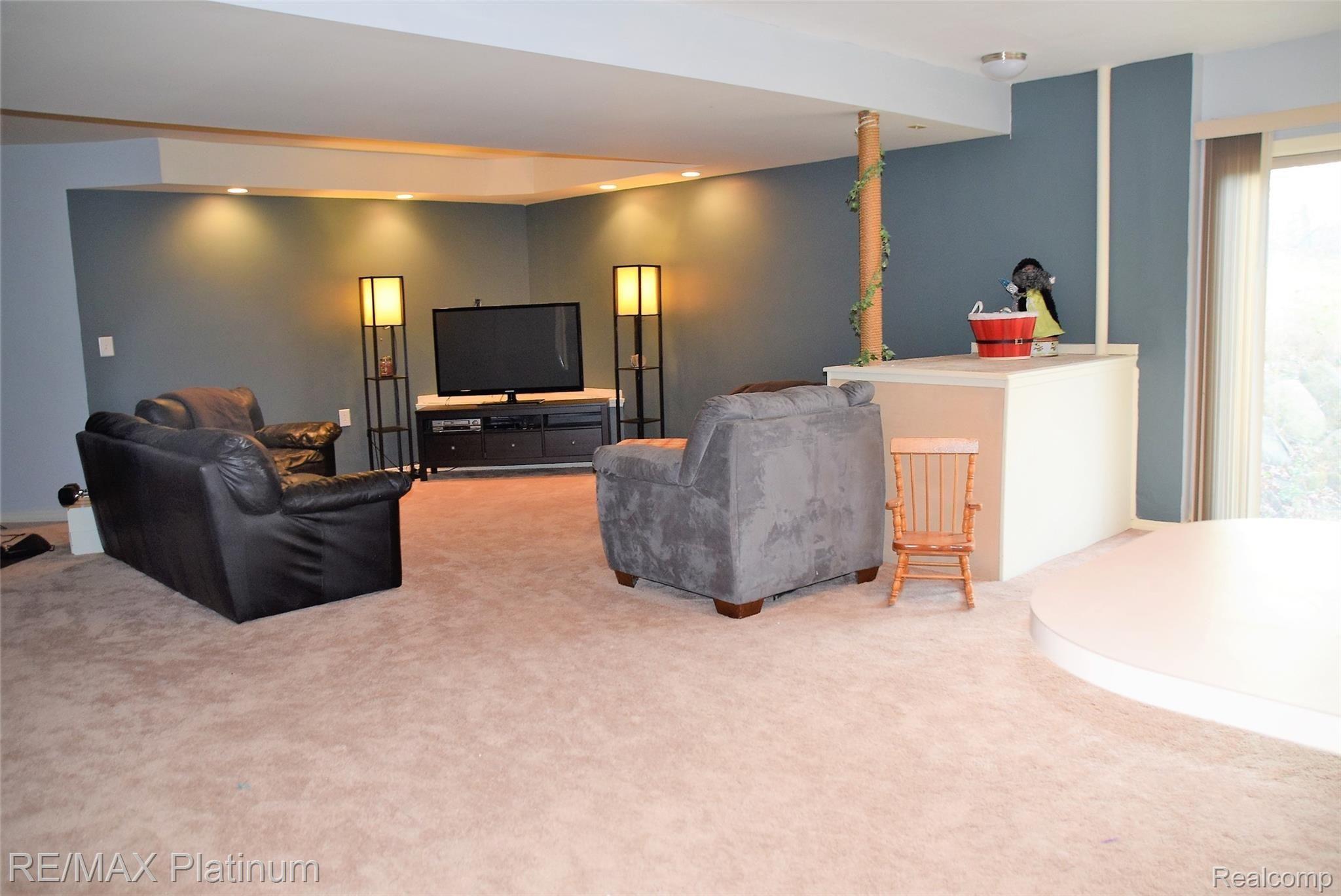 310 North Eager Road Howell, MI 48843 - Photo 26 of 35 basement family room.JPG