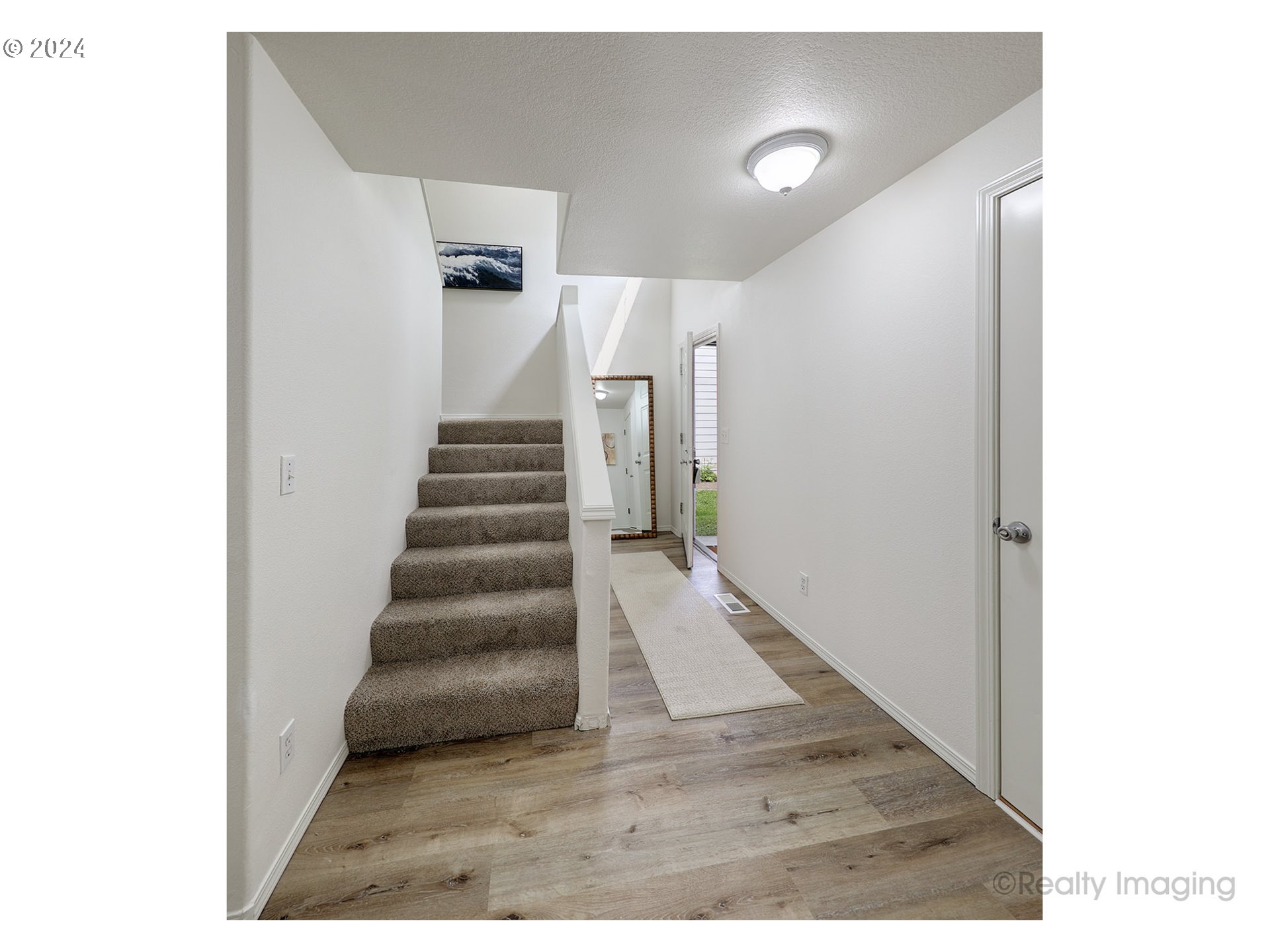 3353 Southwest 174th Avenue Beaverton, OR 97003 - Photo 5 of 33 a view of entryway and hall with wooden floor