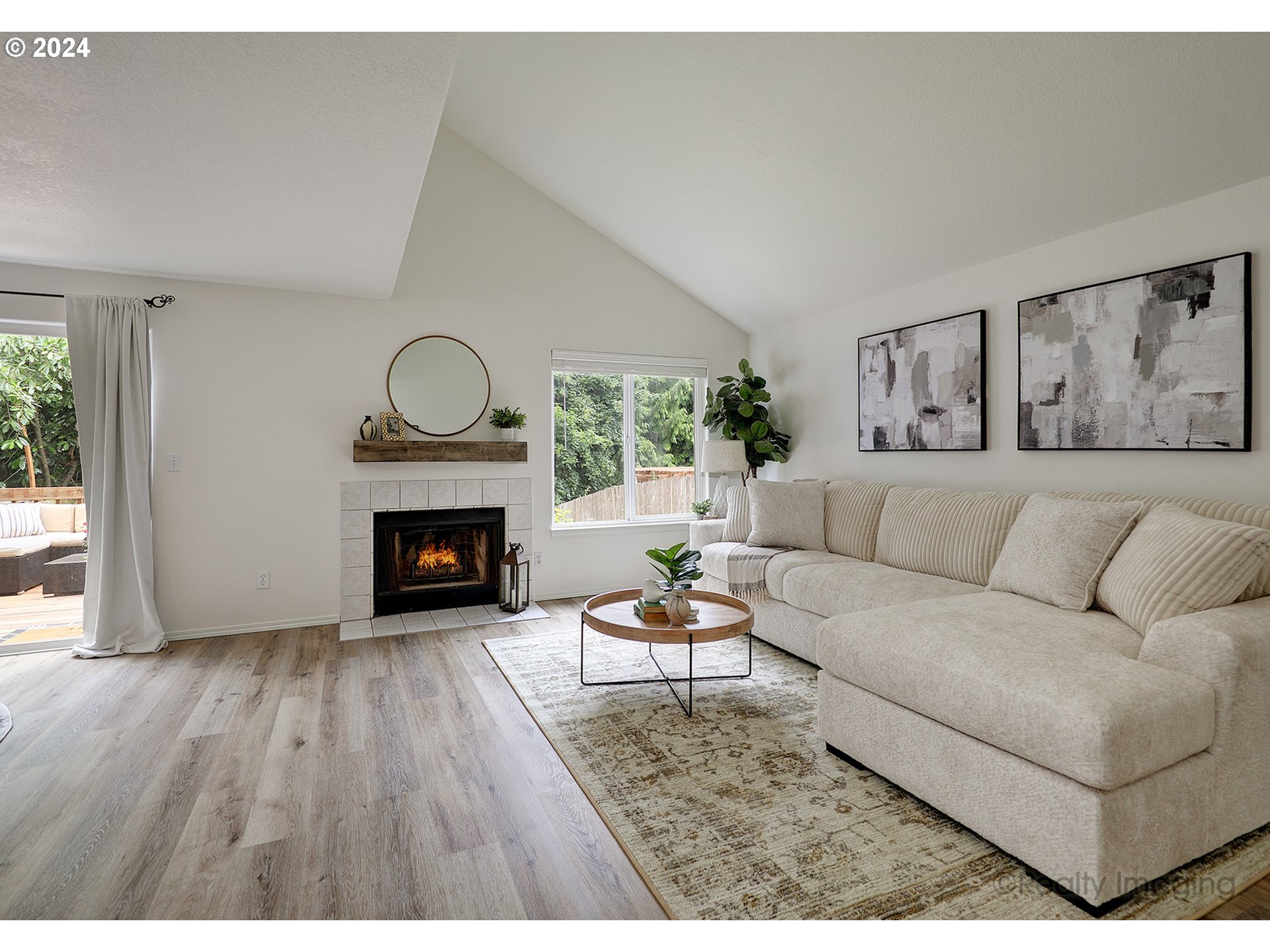 3353 Southwest 174th Avenue Beaverton, OR 97003 - Photo 6 of 33 a living room with furniture and a fireplace