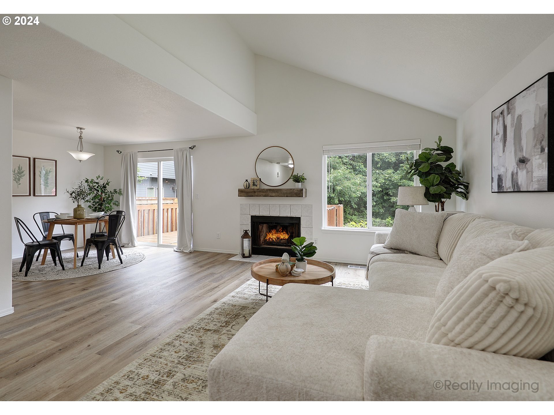 3353 Southwest 174th Avenue Beaverton, OR 97003 - Photo 9 of 33 a living room with furniture and a fireplace