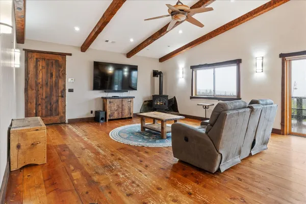 a kitchen with stainless steel appliances a stove a refrigerator and a sink