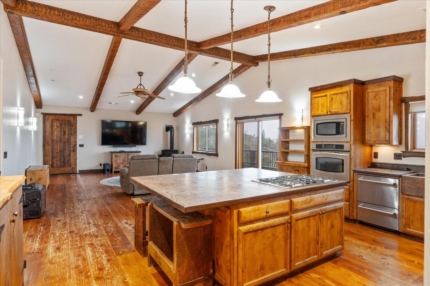 644 Crestview Drive Murphys, CA 95247 - Photo 20 of 56 a kitchen with stainless steel appliances granite countertop a sink a stove and a refrigerator
