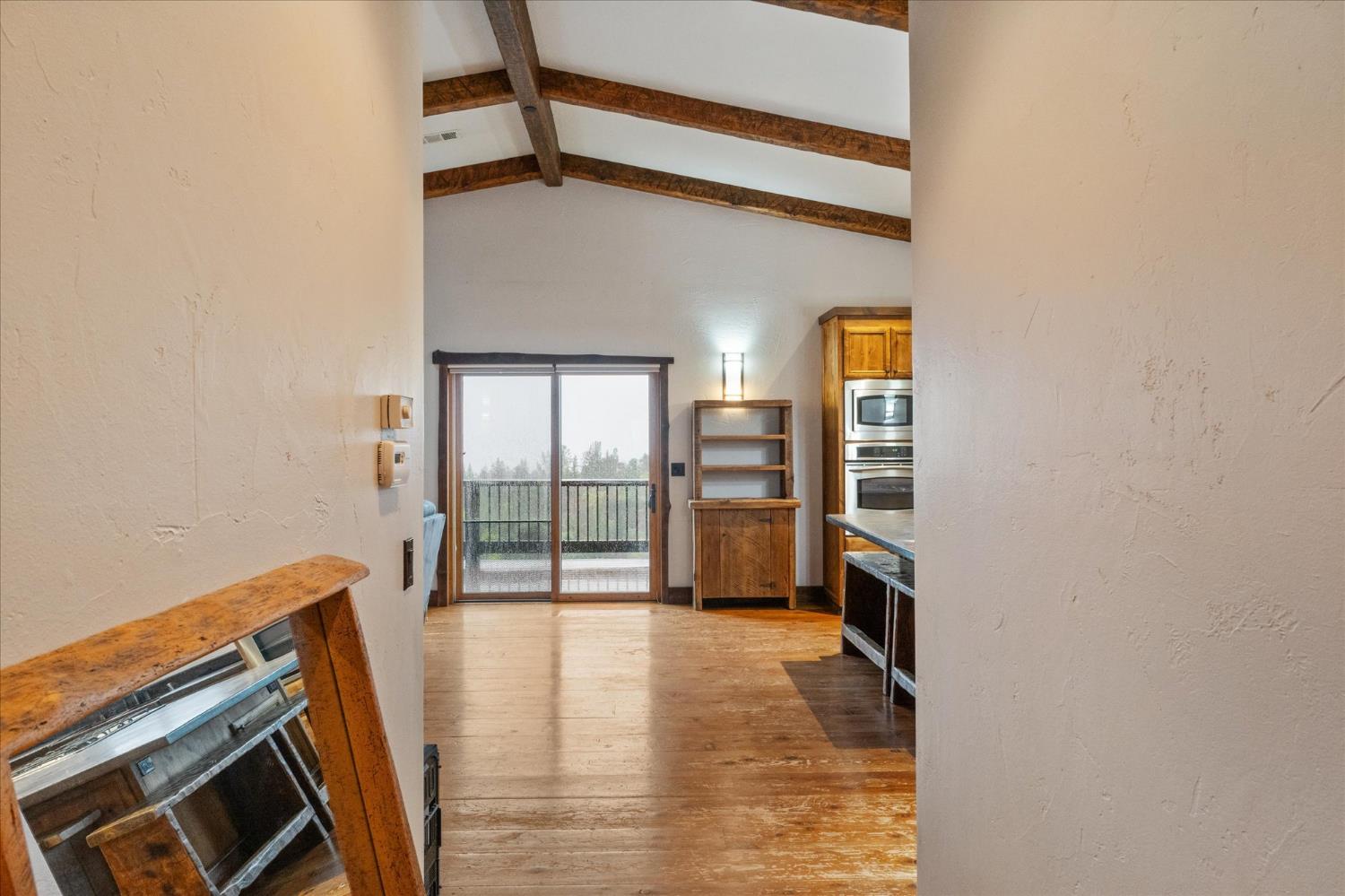 644 Crestview Drive Murphys, CA 95247 - Photo 30 of 56 a view of an empty room with glass door