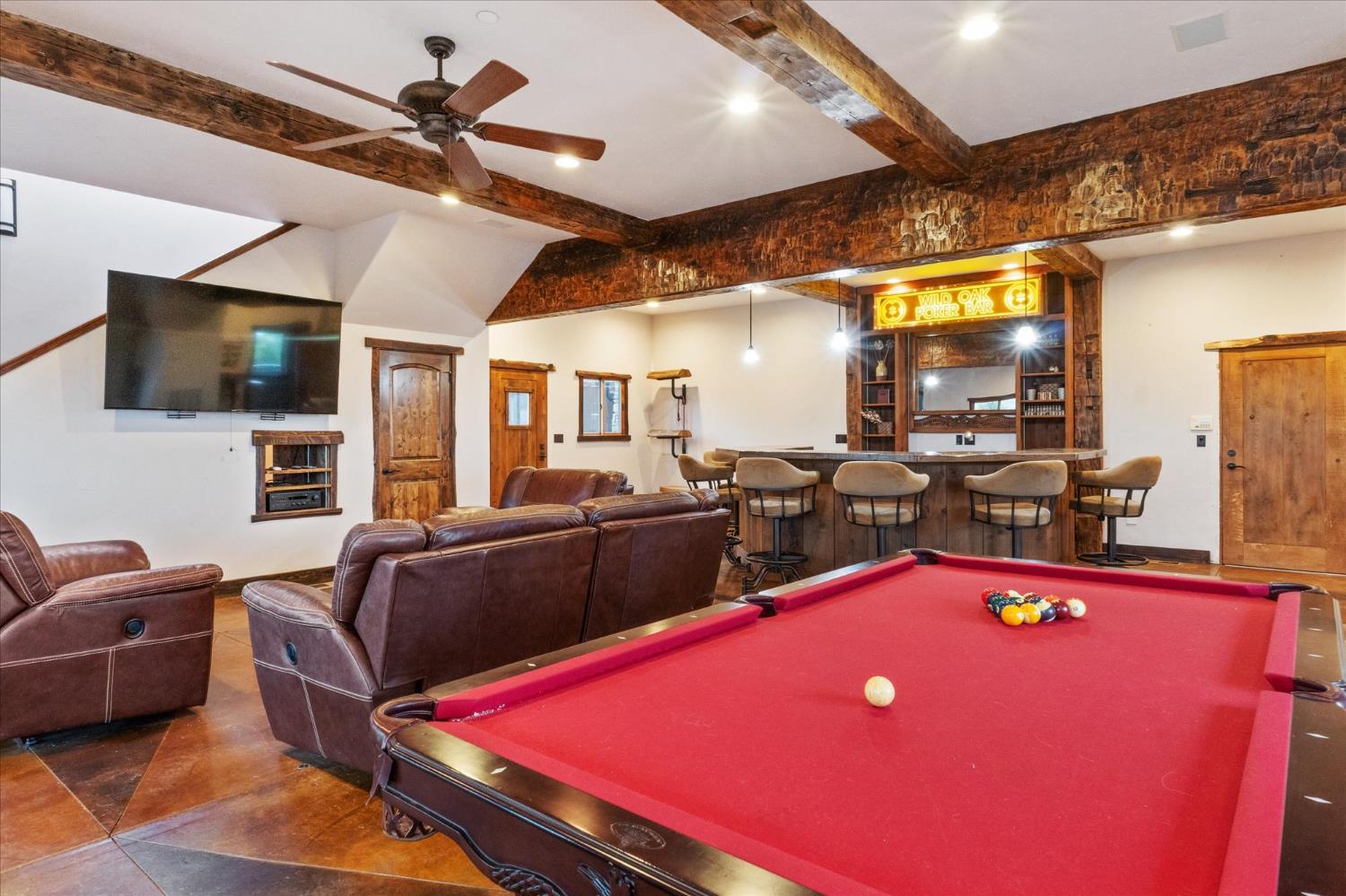 644 Crestview Drive Murphys, CA 95247 - Photo 36 of 56 a living room with furniture pool table flat screen tv and windows