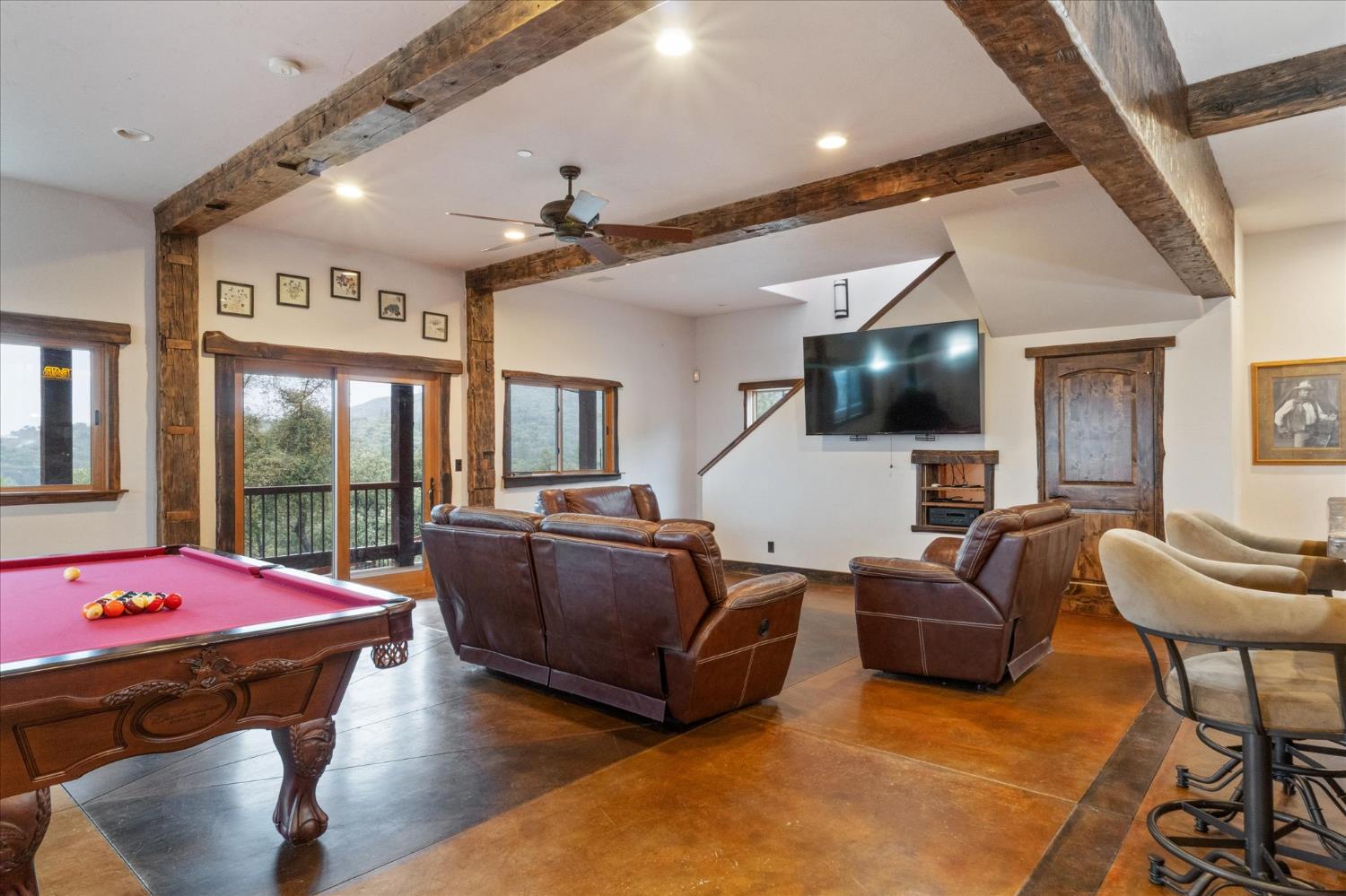 644 Crestview Drive Murphys, CA 95247 - Photo 39 of 56 a living room with furniture and a flat screen tv