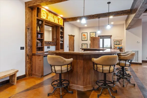 a kitchen with a wooden floor