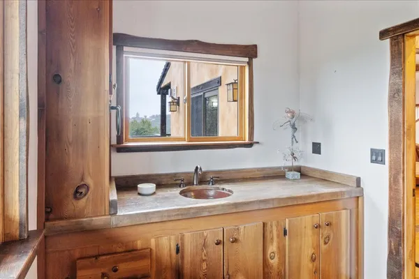 a view of balcony with wooden floor