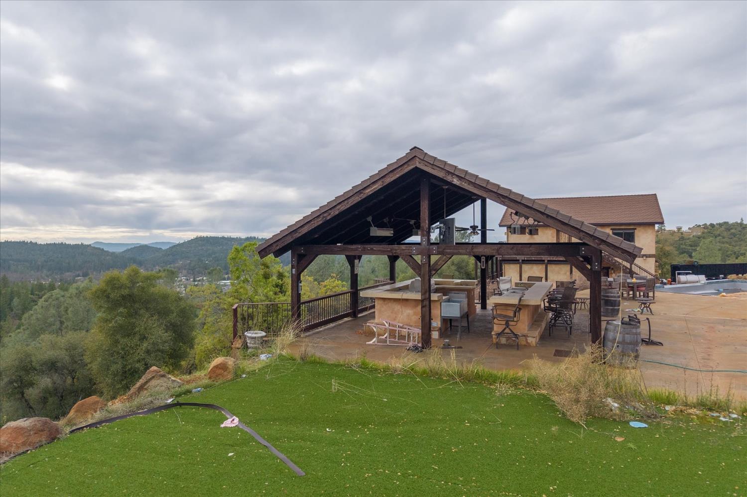 644 Crestview Drive Murphys, CA 95247 - Photo 55 of 56 a view of a house with backyard porch and sitting area