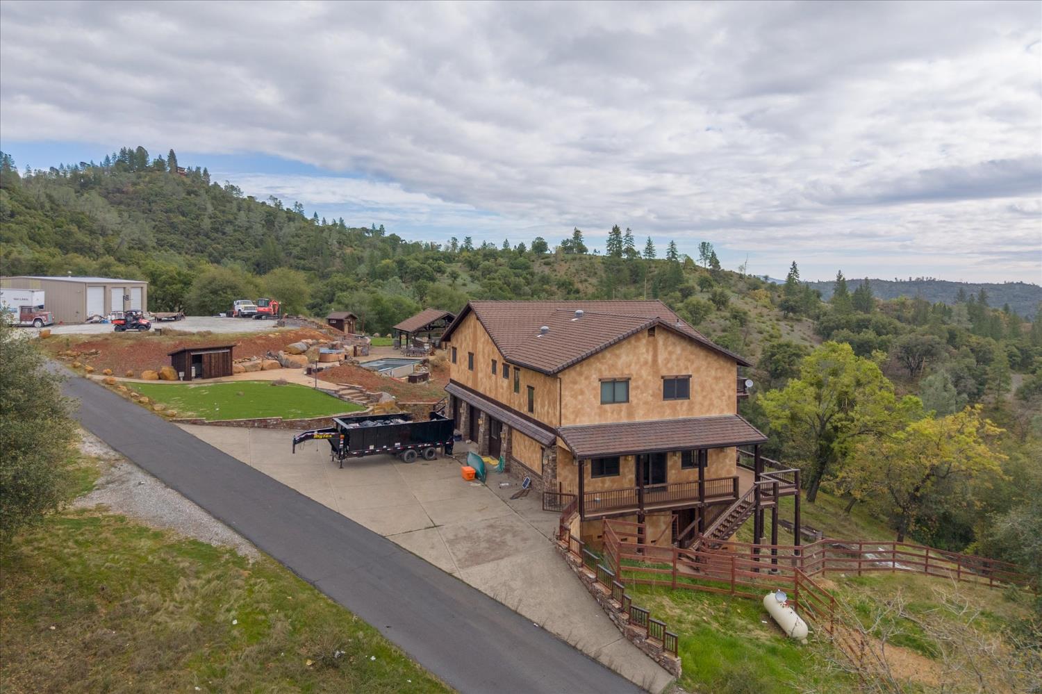644 Crestview Drive Murphys, CA 95247 - Photo 10 of 56 an aerial view of a house with roof deck