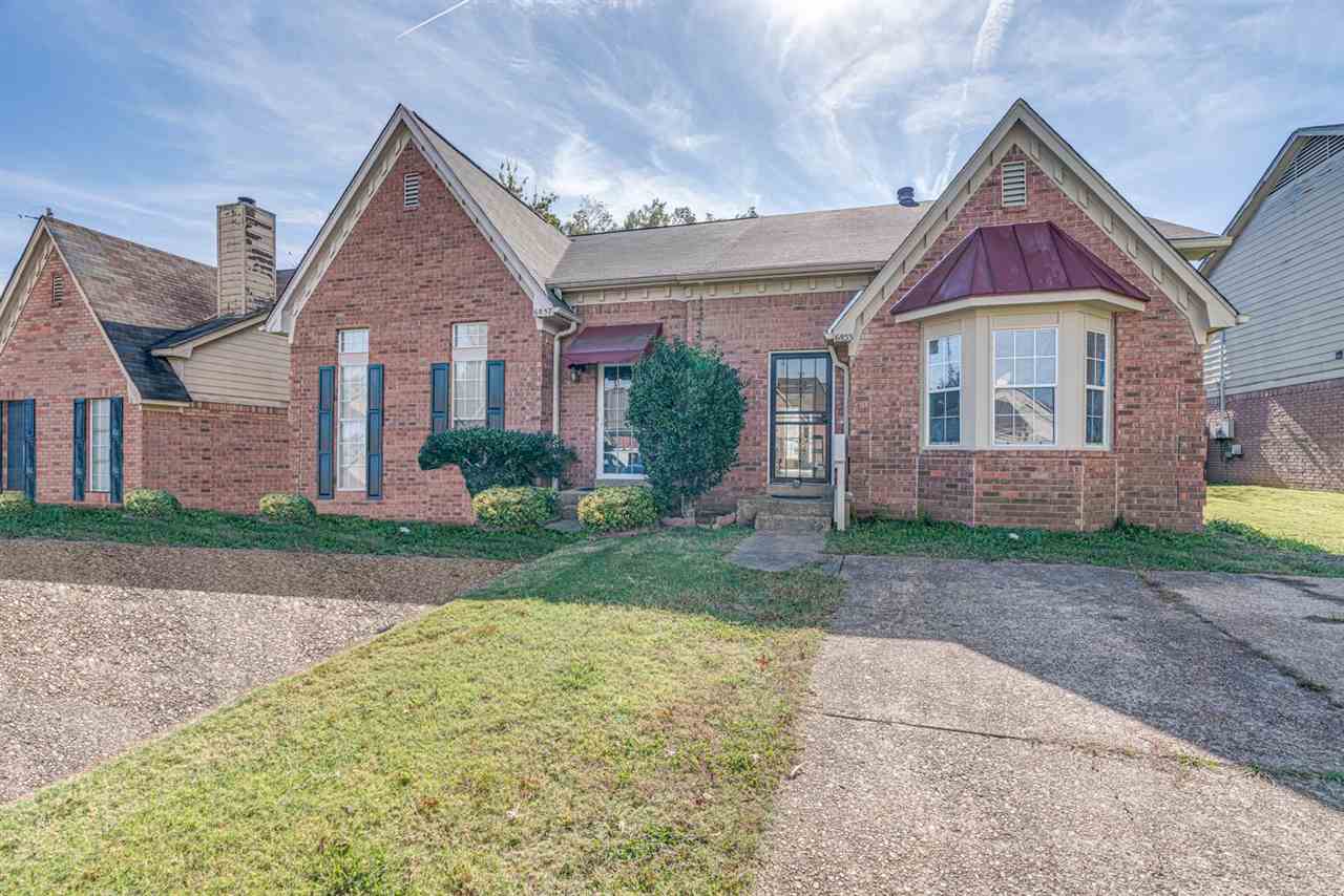 6853 Snyder Road Memphis, TN 38141 - Photo 3 of 23 front view of house with a yard