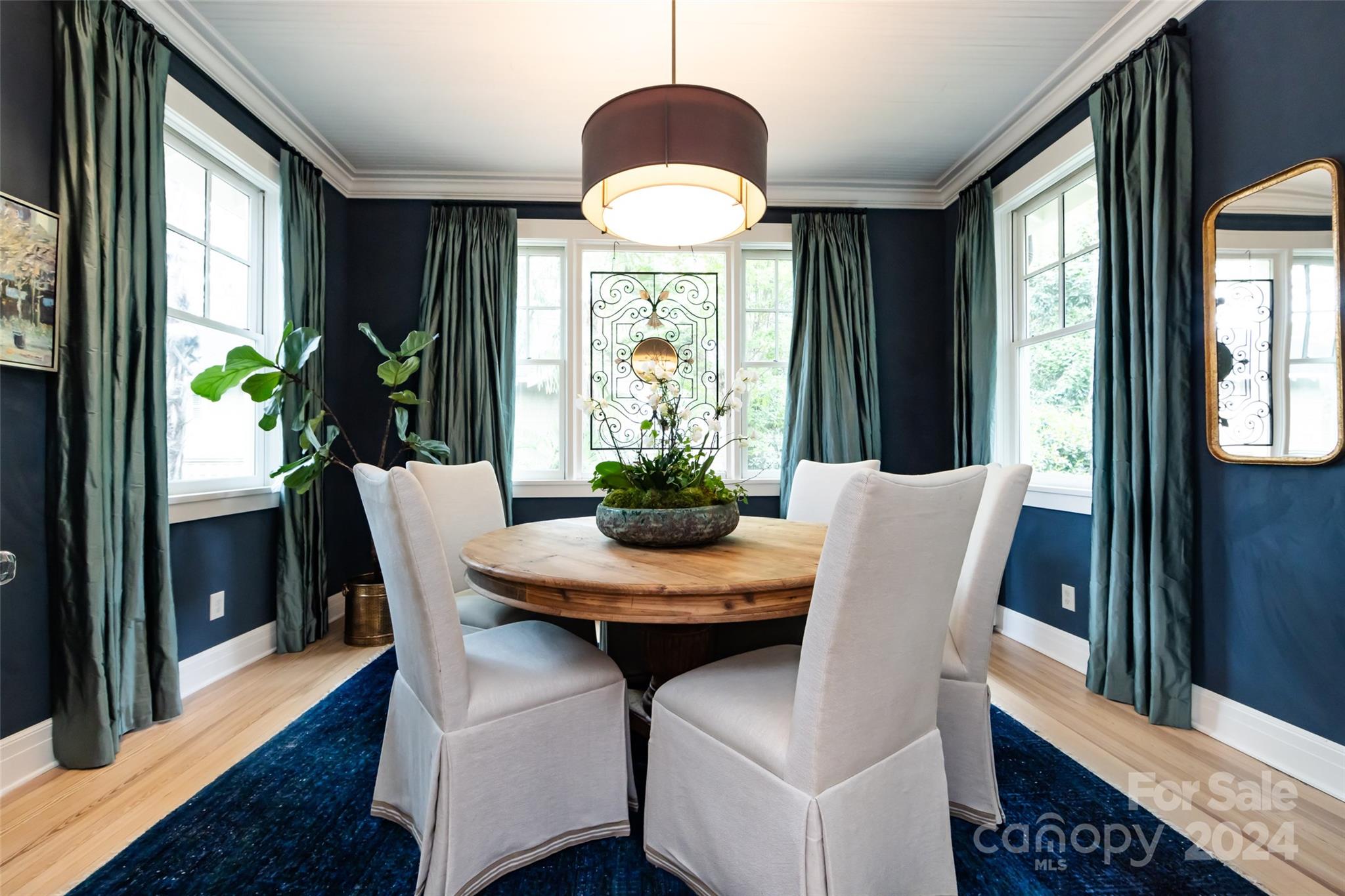 2310 Westfield Road Charlotte, NC 28207 - Photo 13 of 43 a view of a dining room with furniture window and wooden floor