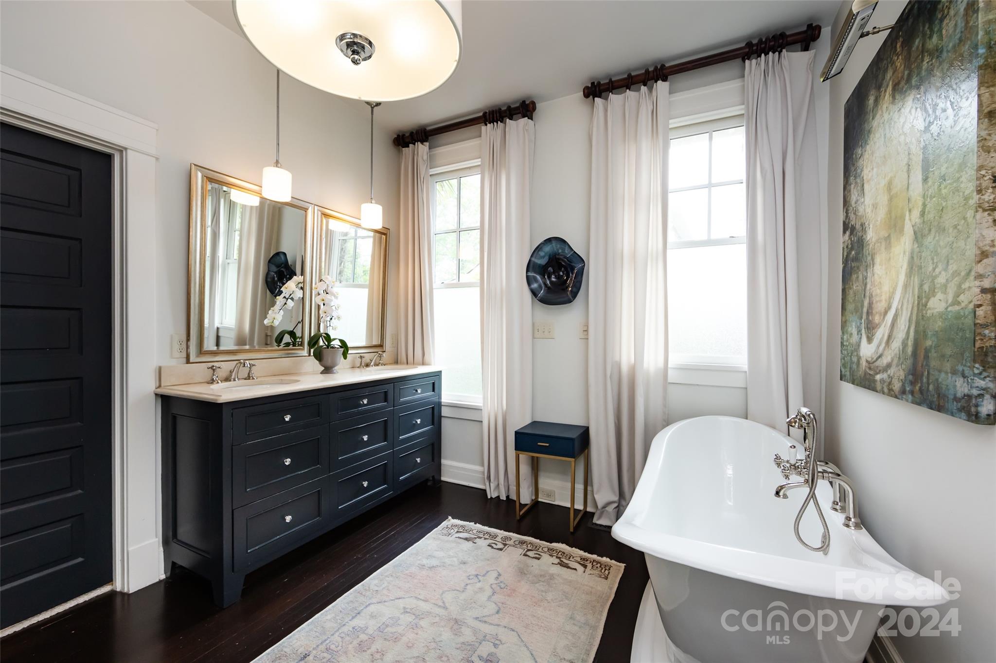 2310 Westfield Road Charlotte, NC 28207 - Photo 20 of 43 a bathroom with a sink and a mirror