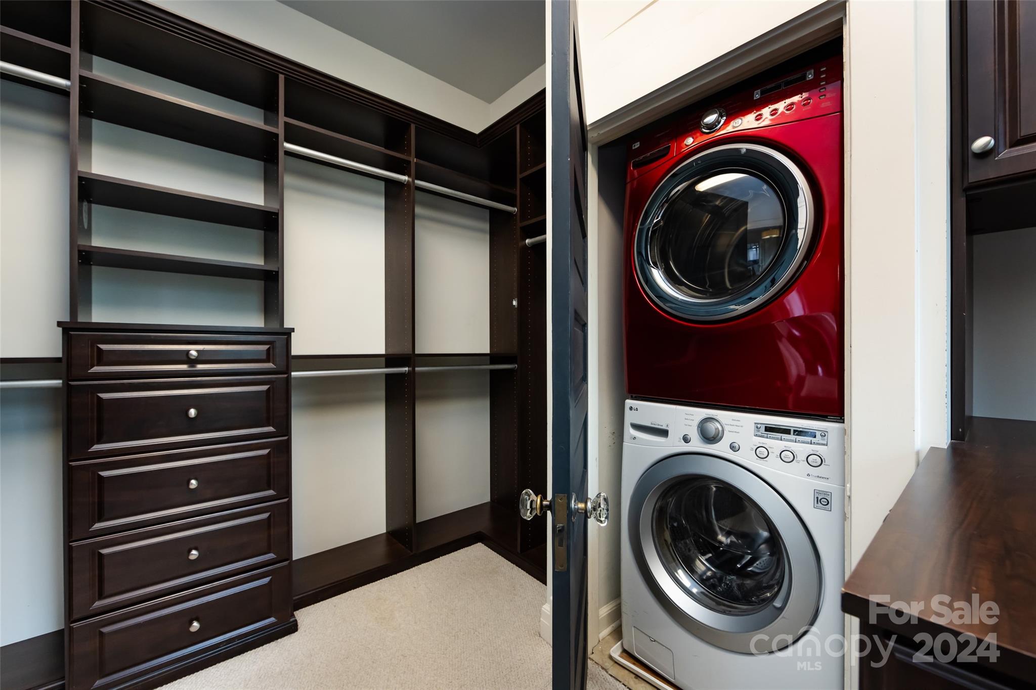 2310 Westfield Road Charlotte, NC 28207 - Photo 23 of 43 a view of a storage and utility room with washer and dryer