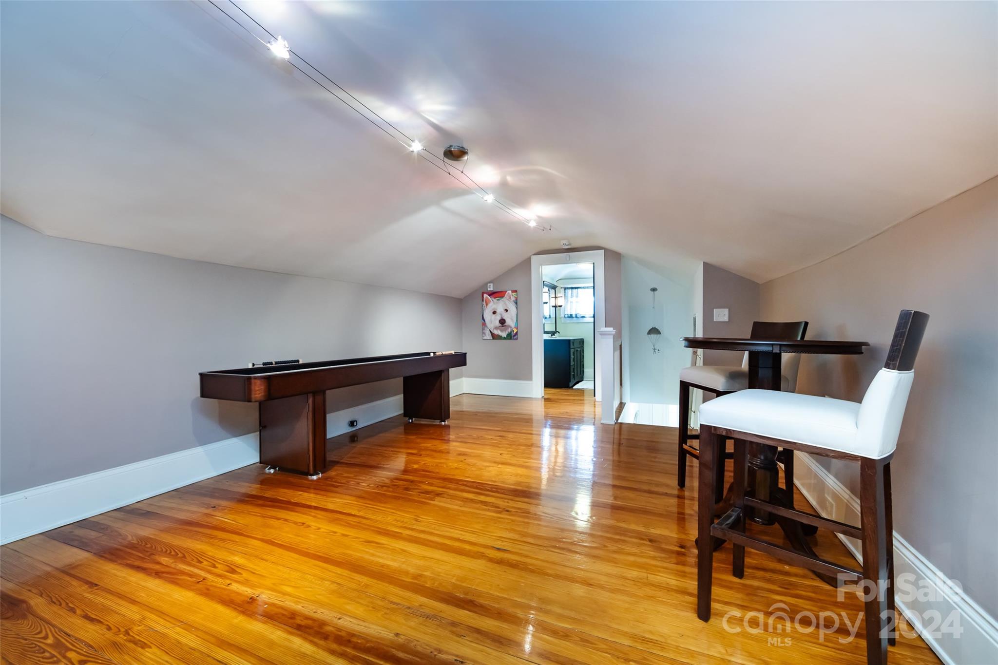 2310 Westfield Road Charlotte, NC 28207 - Photo 27 of 43 a room with furniture and wooden floor