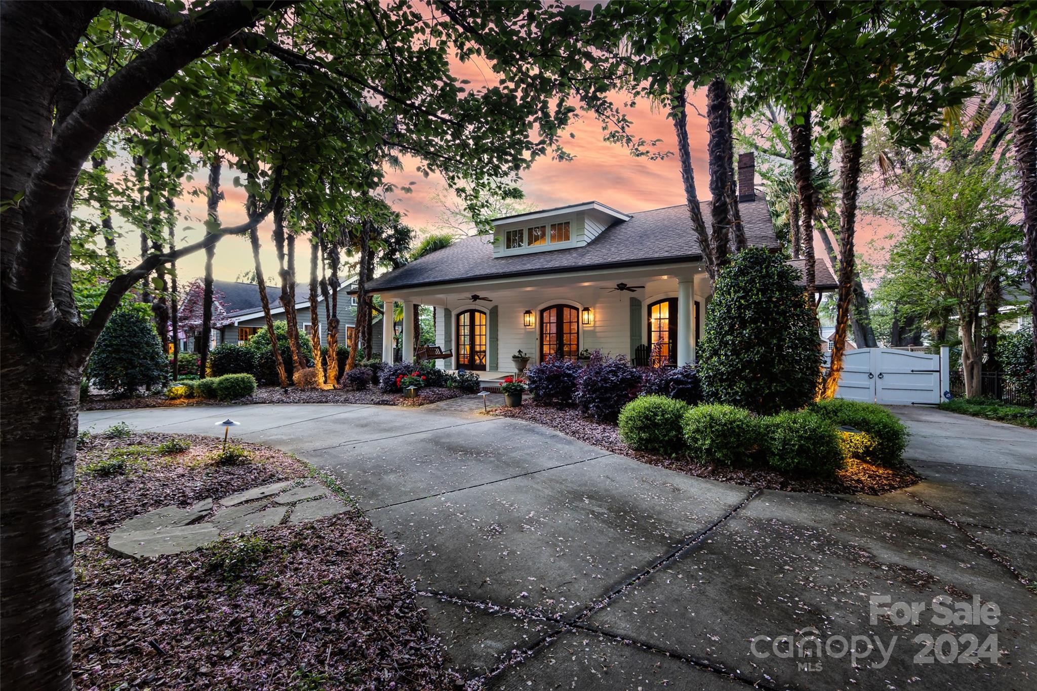 2310 Westfield Road Charlotte, NC 28207 - Photo 3 of 43 a view of a house with a yard and large trees
