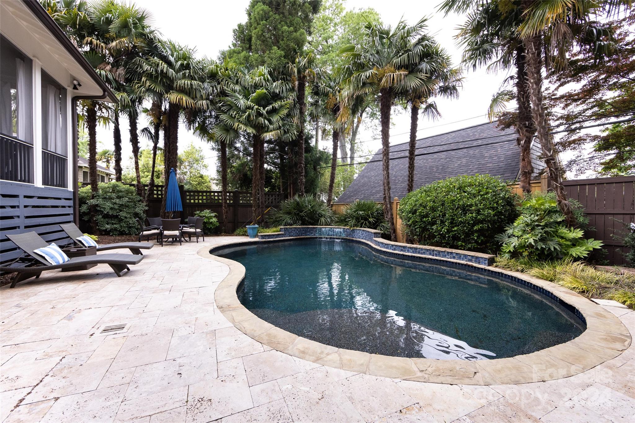 2310 Westfield Road Charlotte, NC 28207 - Photo 37 of 43 a view of swimming pool with outdoor seating and plants