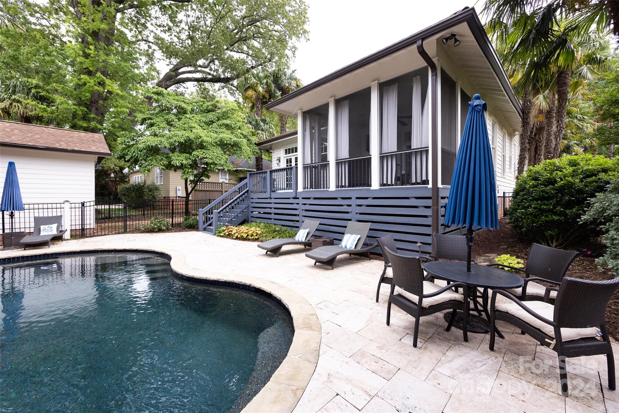 2310 Westfield Road Charlotte, NC 28207 - Photo 39 of 43 a view of a house with swimming pool and sitting area