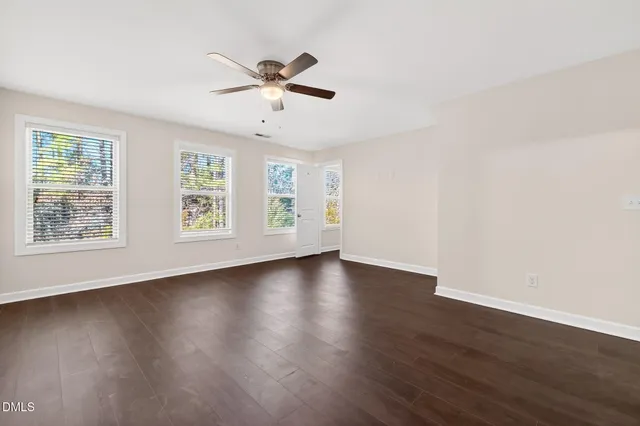 a bathroom with a shower sink and mirror
