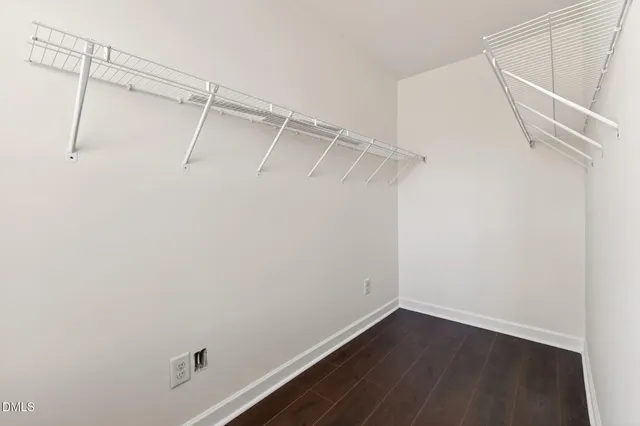 a view of a room with racks on the wall