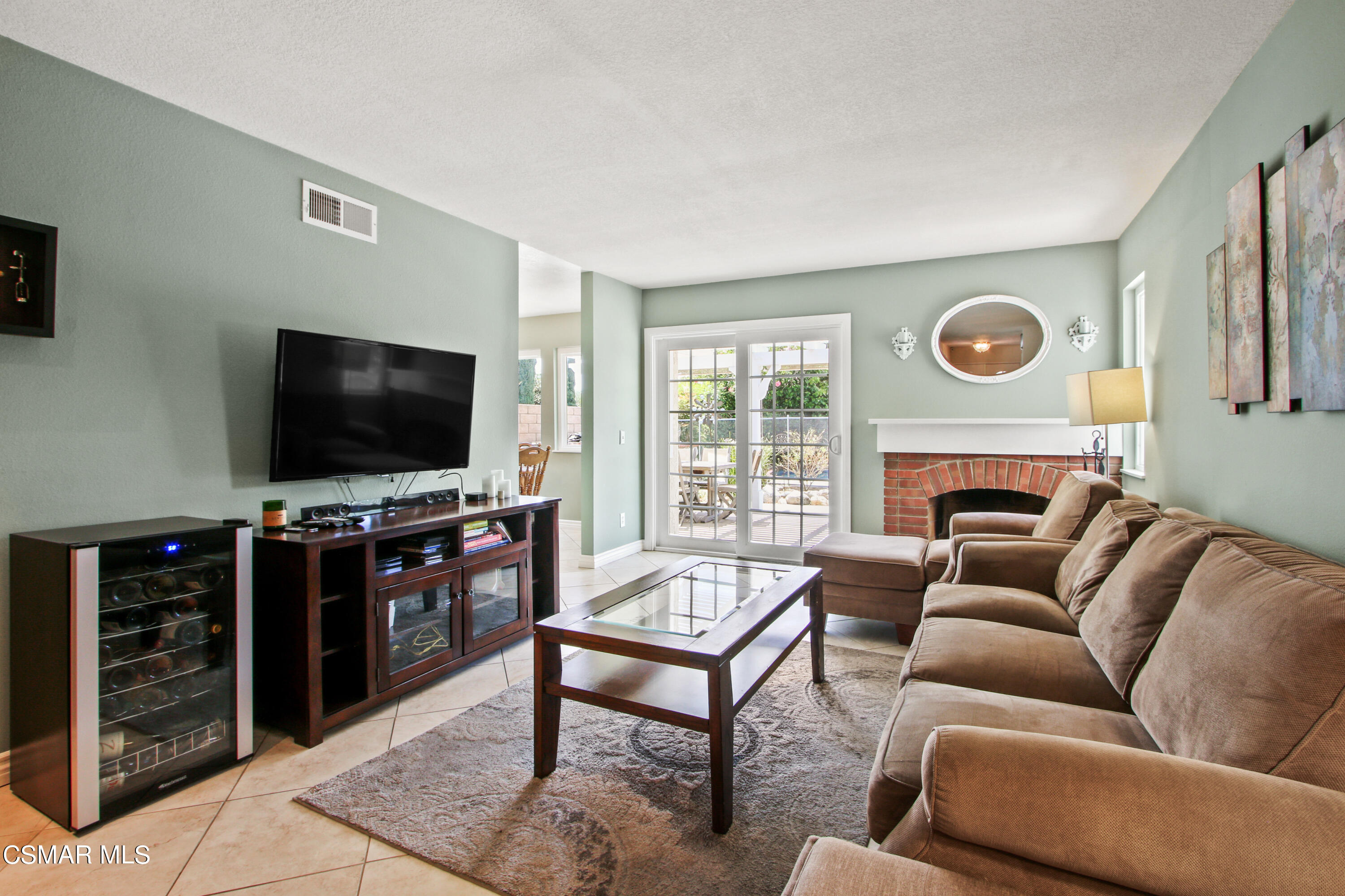 2745 Gum Circle Simi Valley, CA 93065 - Photo 15 of 40 a living room with furniture and a flat screen tv