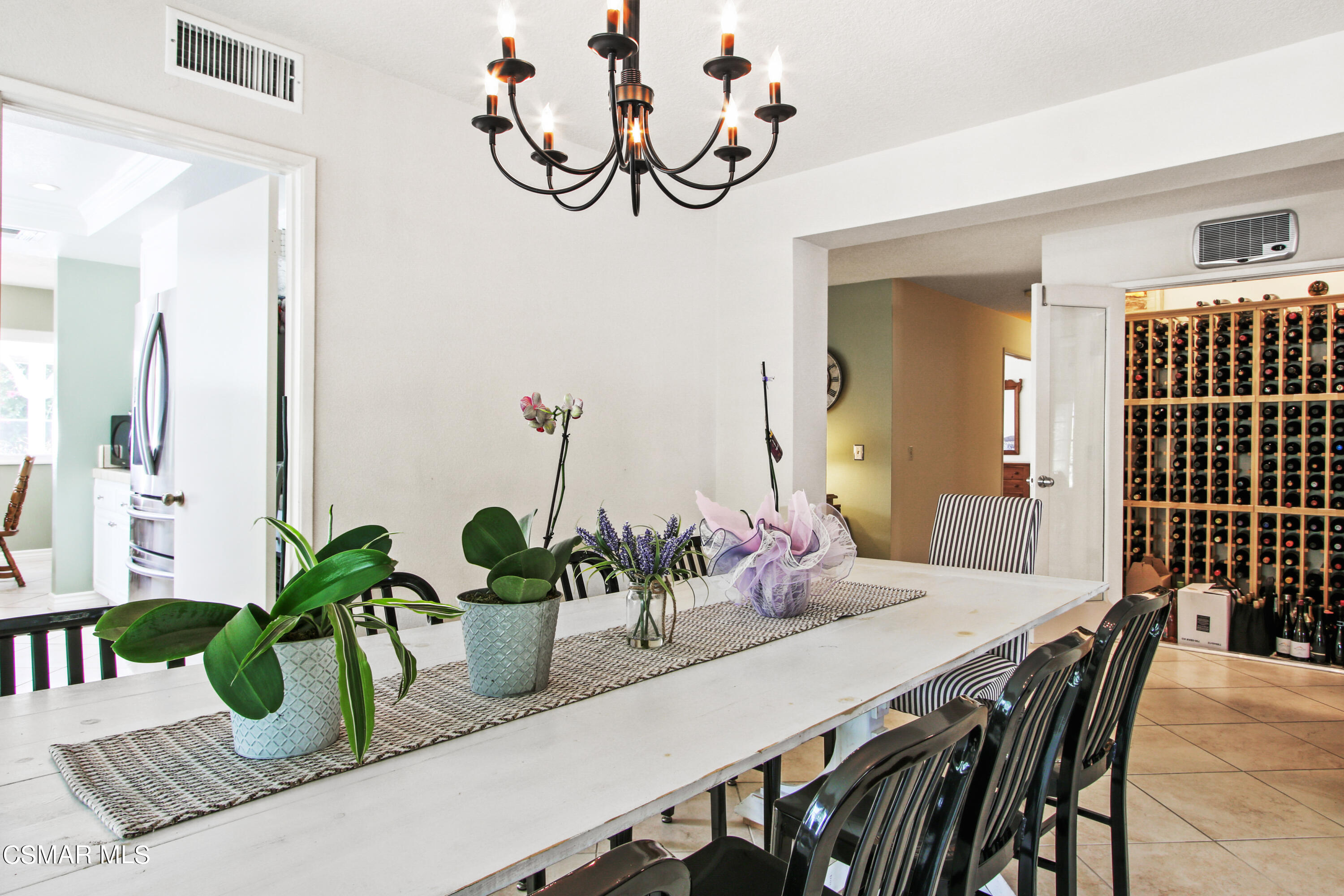 2745 Gum Circle Simi Valley, CA 93065 - Photo 16 of 40 a dining room with furniture and potted plant