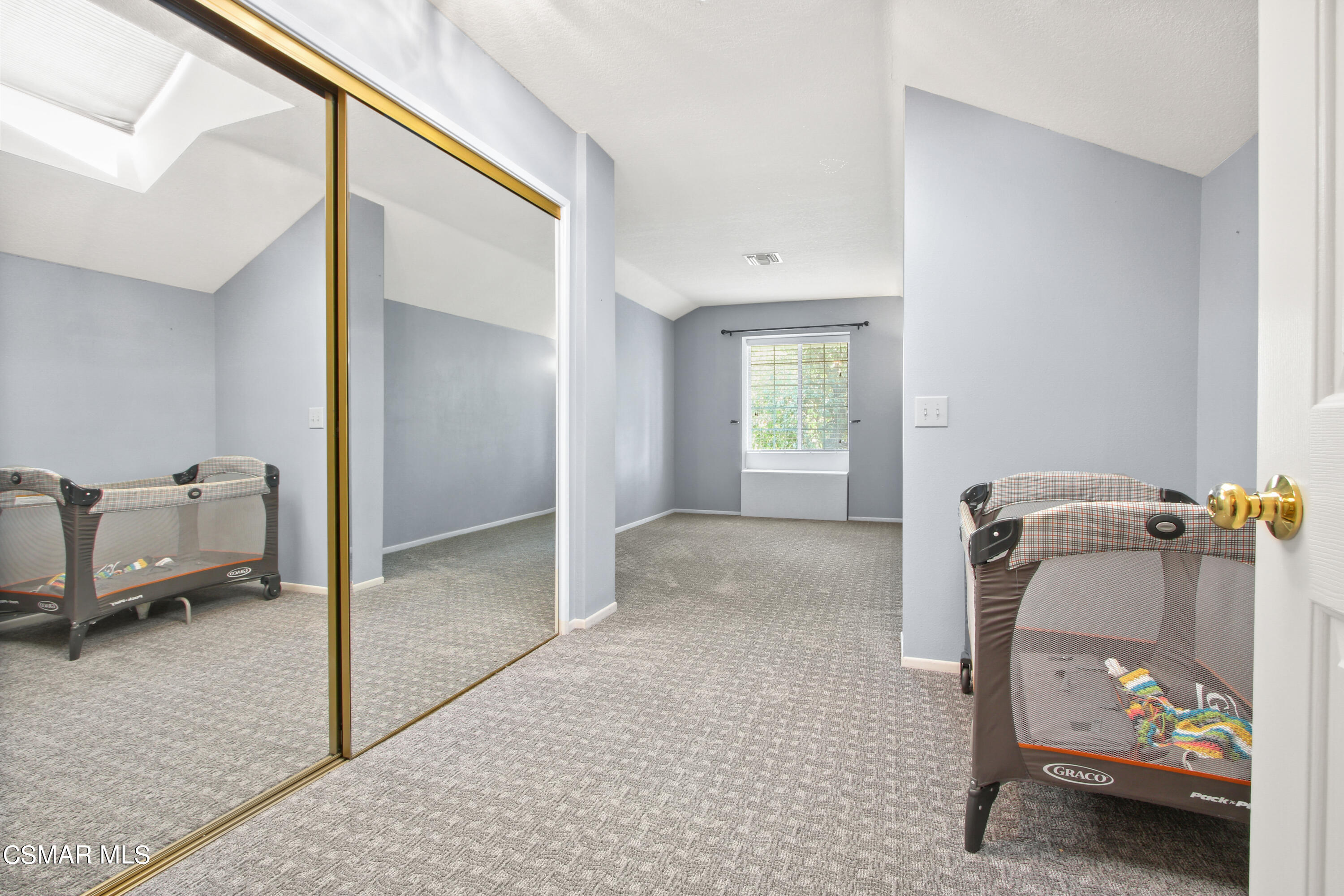 2745 Gum Circle Simi Valley, CA 93065 - Photo 34 of 40 a view of a hallway to a livingroom with furniture and a window