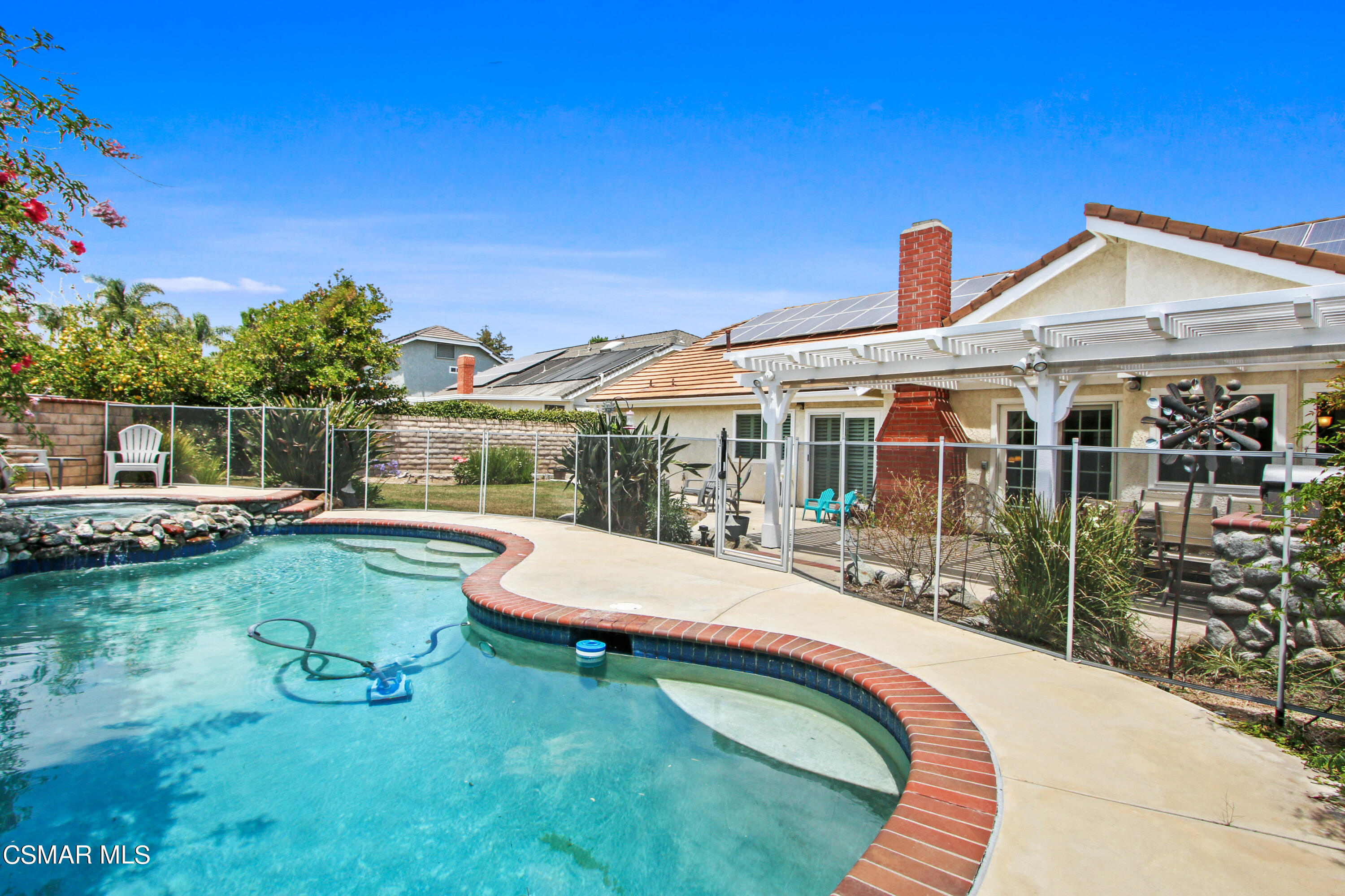 2745 Gum Circle Simi Valley, CA 93065 - Photo 5 of 40 a swimming pool with outdoor seating and yard