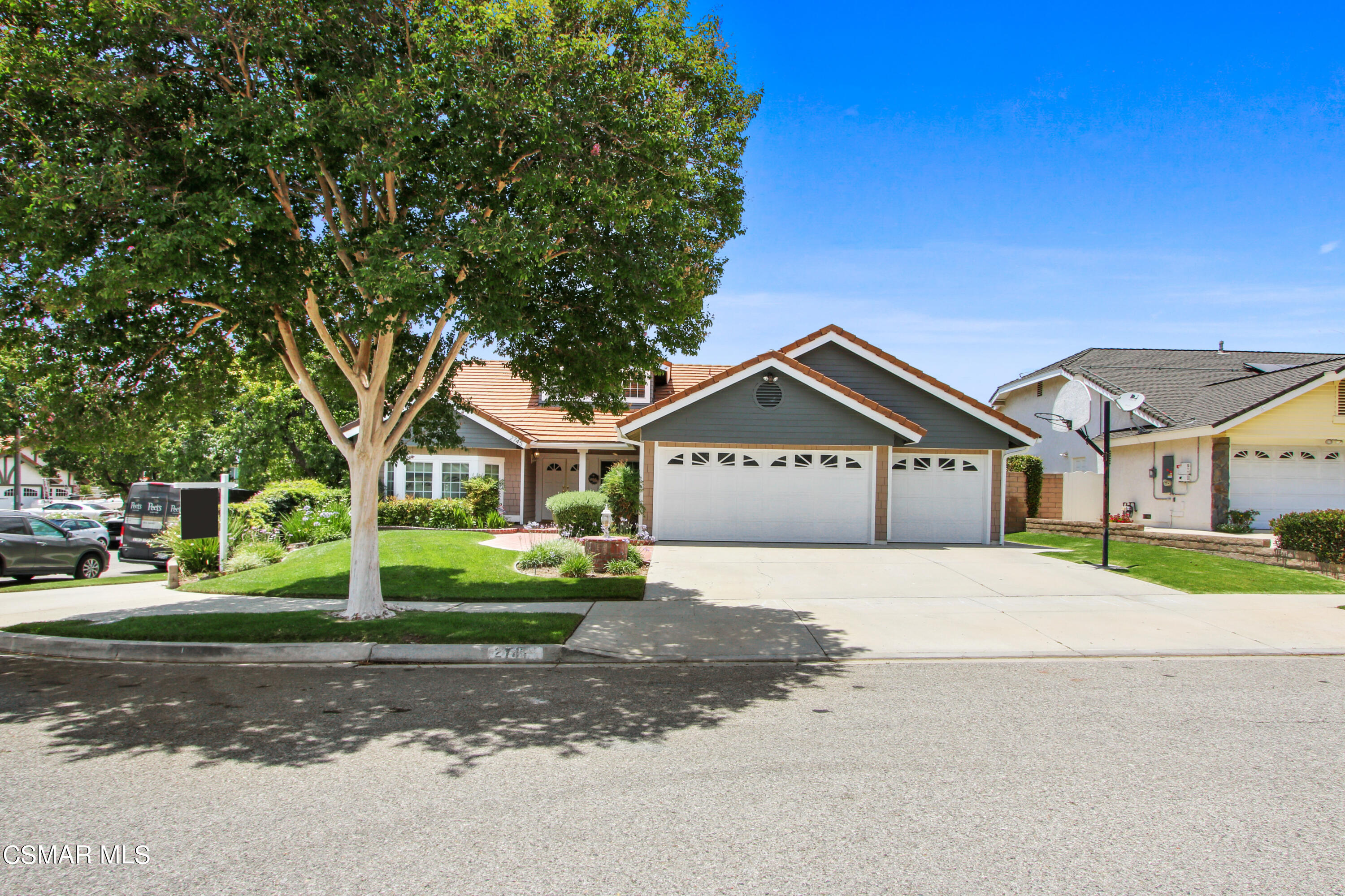 2745 Gum Circle Simi Valley, CA 93065 - Photo 8 of 40 a house with a big yard and large trees