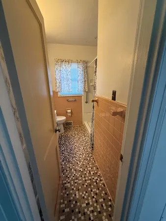 a bathroom with a sink and a shower