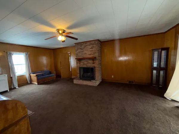 a view of a livingroom with a fireplace