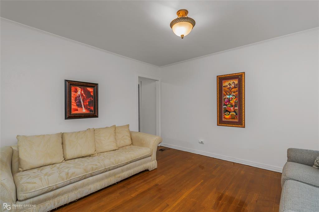515 Davis Street Minden, LA 71055 - Photo 10 of 28 a living room with furniture and a wooden floor