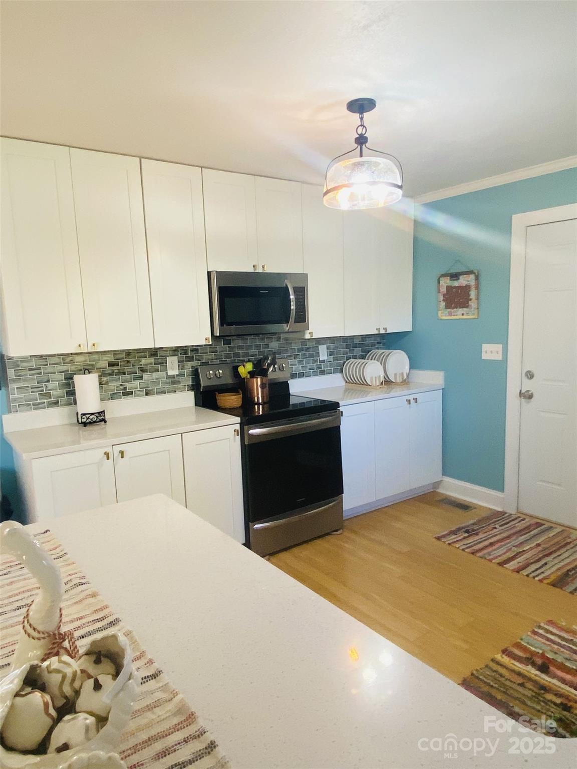422 Mirror Lake Road Salisbury, NC 28146 - Photo 6 of 18 a kitchen with a sink appliances and cabinets